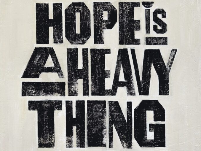 artwork for Joy Oladokun album "Hope Is A Heavy Thing"