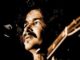 Cover art for Tom Piazza book "Living In The Present With John Prine"
