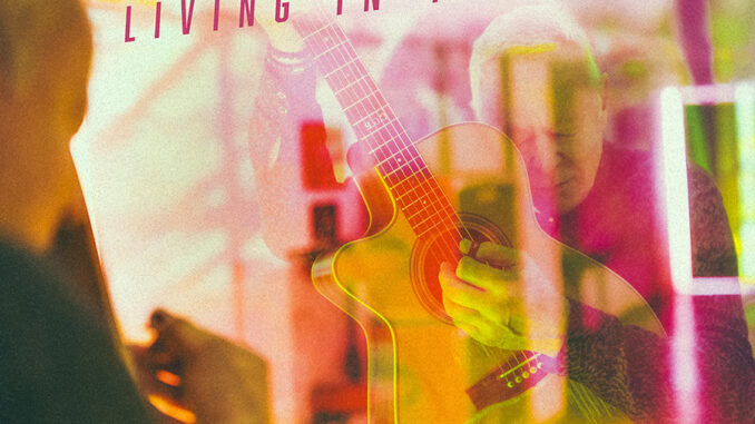 artwork for Tommy Emmanuel album "Living In The Light"